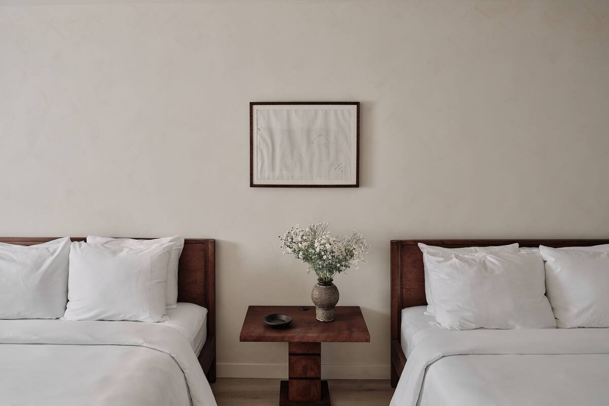 Signature River View Double Queen | Premium bedding, desk, laptop workspace, blackout drapes