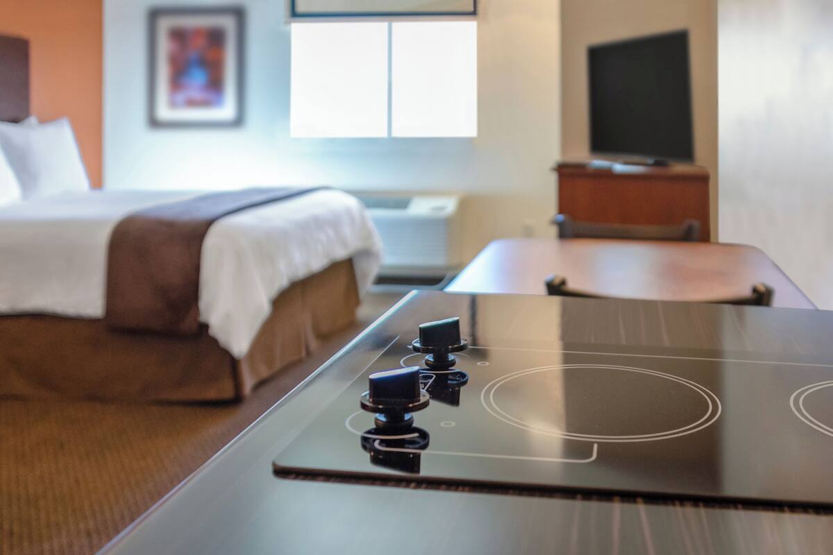 Premium bedding, pillowtop beds, desk, laptop workspace