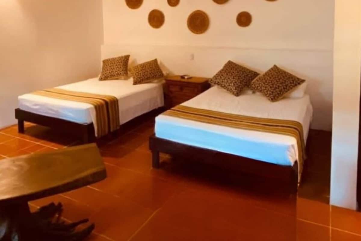 Comfort Quadruple Room, 2 Double Beds | In-room safe, iron/ironing board, free WiFi