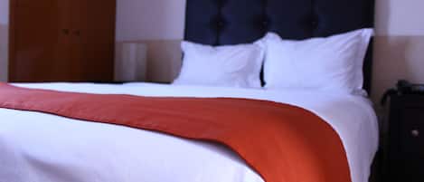 Desk, laptop workspace, free WiFi, bed sheets