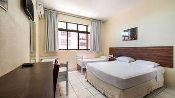 Quadruple Room, Multiple Beds | Minibar, desk, free WiFi, bed sheets