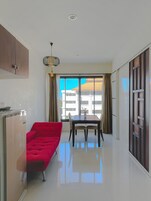 Habitación Deluxe | Baño | Ducha y cabezal de ducha tipo lluvia