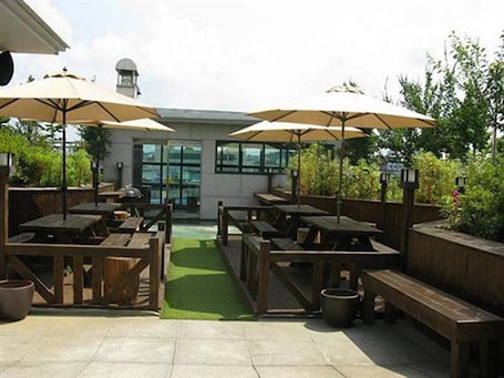 BBQ/picnic area. Asia Tourist Hotel