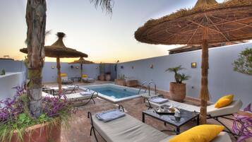 Outdoor pool, pool umbrellas, pool loungers