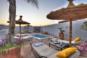 Outdoor pool, pool umbrellas, pool loungers