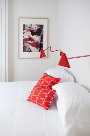 Premium bedding, down comforters, pillowtop beds, in-room safe