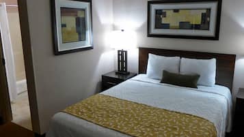 Desk, blackout drapes, iron/ironing board, bed sheets