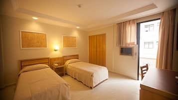 Deluxe Twin Room | Minibar, desk, blackout drapes, free WiFi