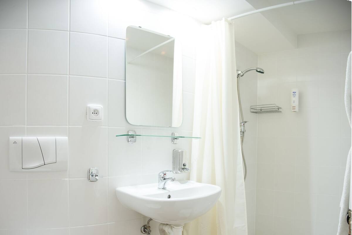 Shower, free toiletries, hair dryer, towels