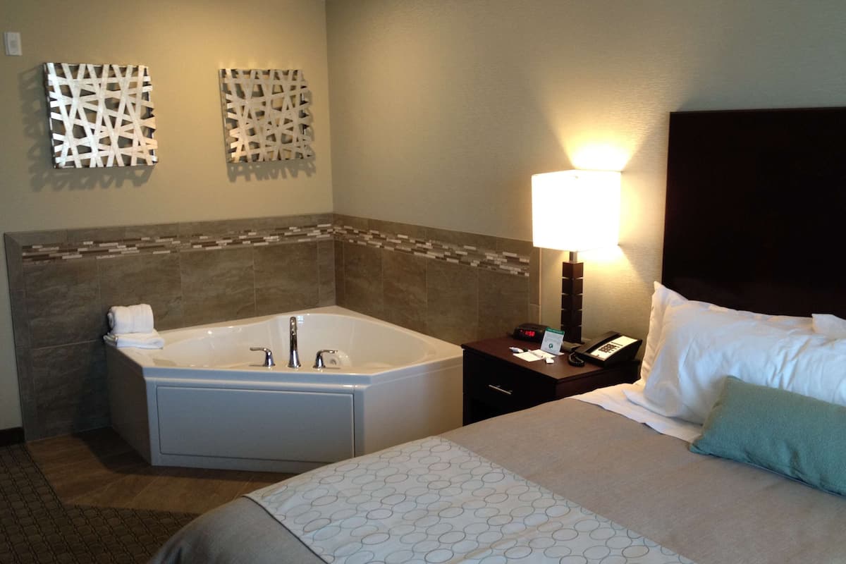 suite, 1 king bed | pool | indoor pool, pool umbrellas