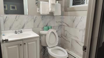 Standard Room, 1 King Bed, Non Smoking, Refrigerator | Bathroom | Shower, free toiletries, towels