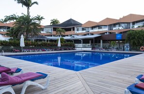 Outdoor pool, pool umbrellas, sun loungers