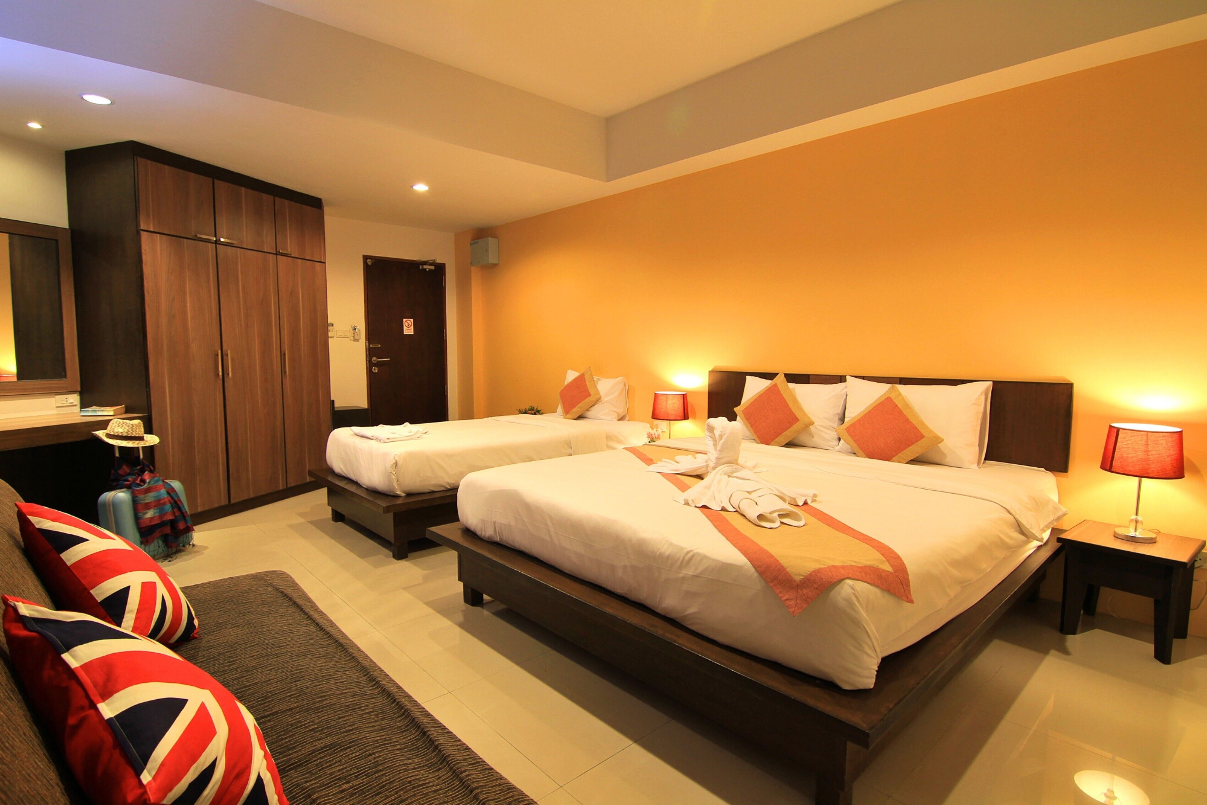 deluxe family room  | hypo-allergenic bedding, in-room safe, desk, blackout curtains