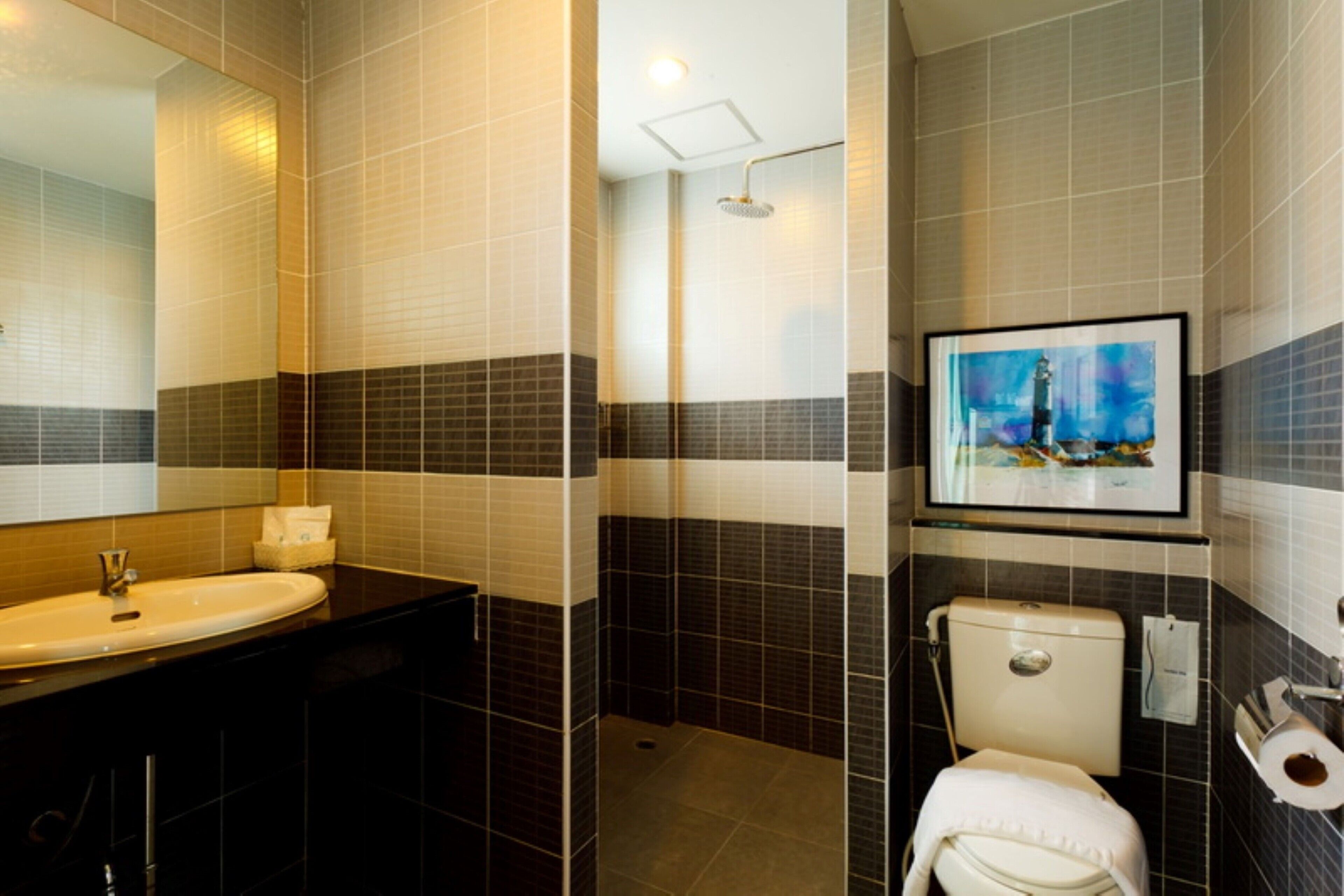 superior twin | bathroom | shower, rainfall showerhead, free toiletries, hair dryer