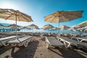 Private beach, sun-loungers, beach umbrellas