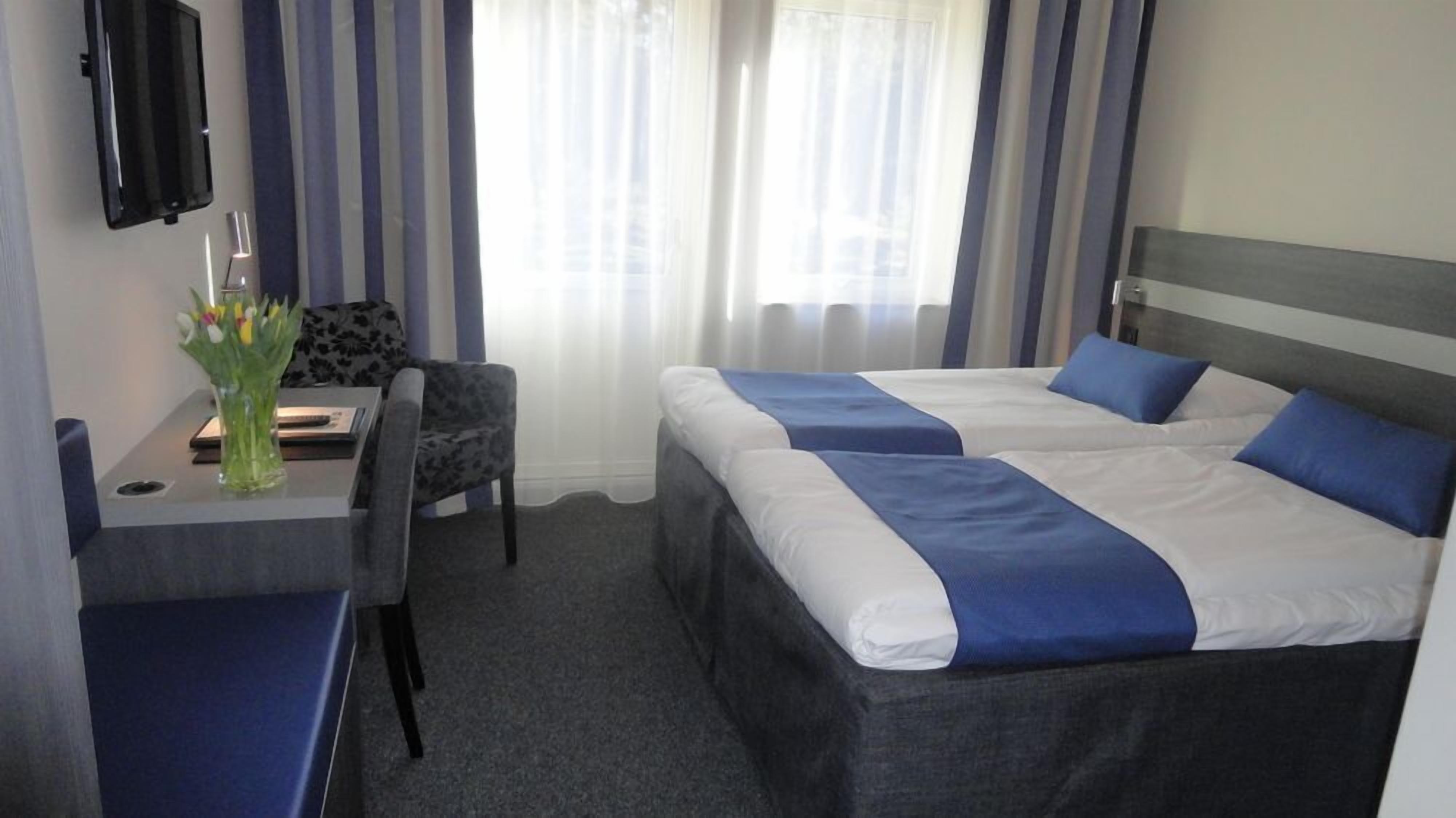 Desk, blackout curtains, rollaway beds, free WiFi
