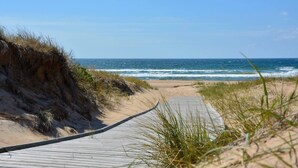 A wooden boardwalk leading to a sandy beach with ocean views. - Tyleback Hotell & Konferens, BW Signature Collection (Halmstad)