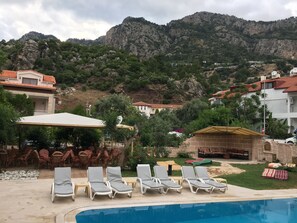 Outdoor pool, pool umbrellas, sun loungers