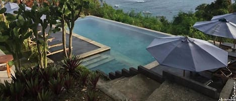 2 outdoor pools, pool umbrellas, sun loungers