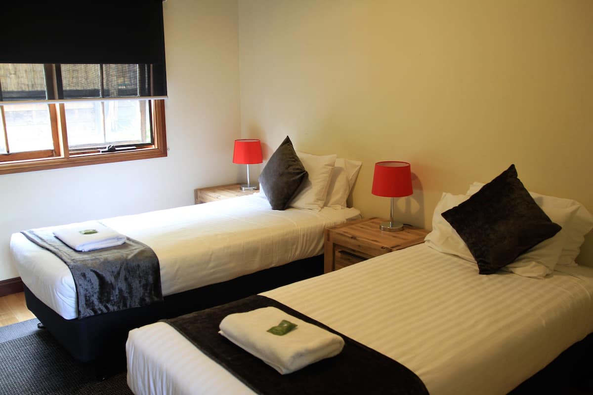 Family Chalet, 2 Bedrooms, Garden Area | Iron/ironing board, cribs/infant beds, rollaway beds