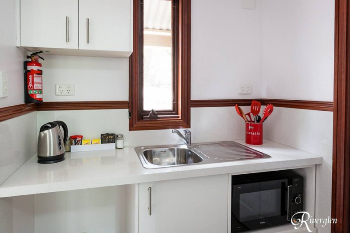 Standard Studio | Private kitchenette | Coffee/tea maker, full-size fridge, microwave, cookware/dishes/utensils