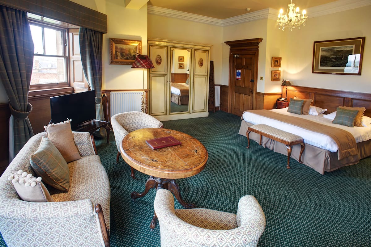 family double or twin room, river view | desk, iron/ironing board, cots/infant beds, rollaway beds