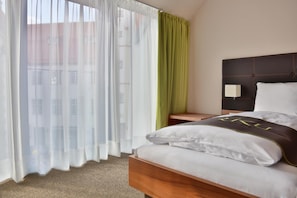 Hypo-allergenic bedding, desk, blackout drapes, soundproofing