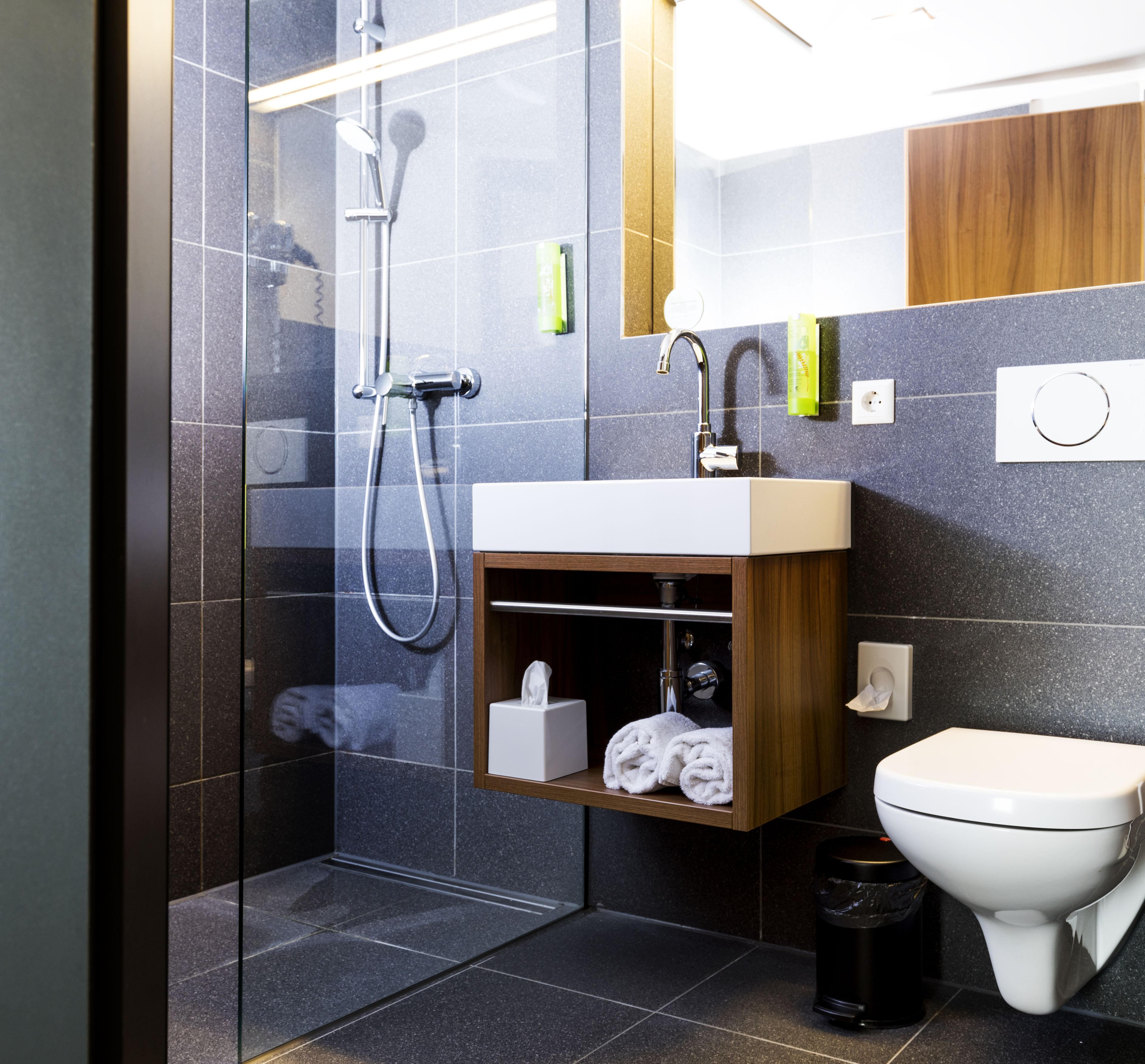 shower, hair dryer, heated floors, towels