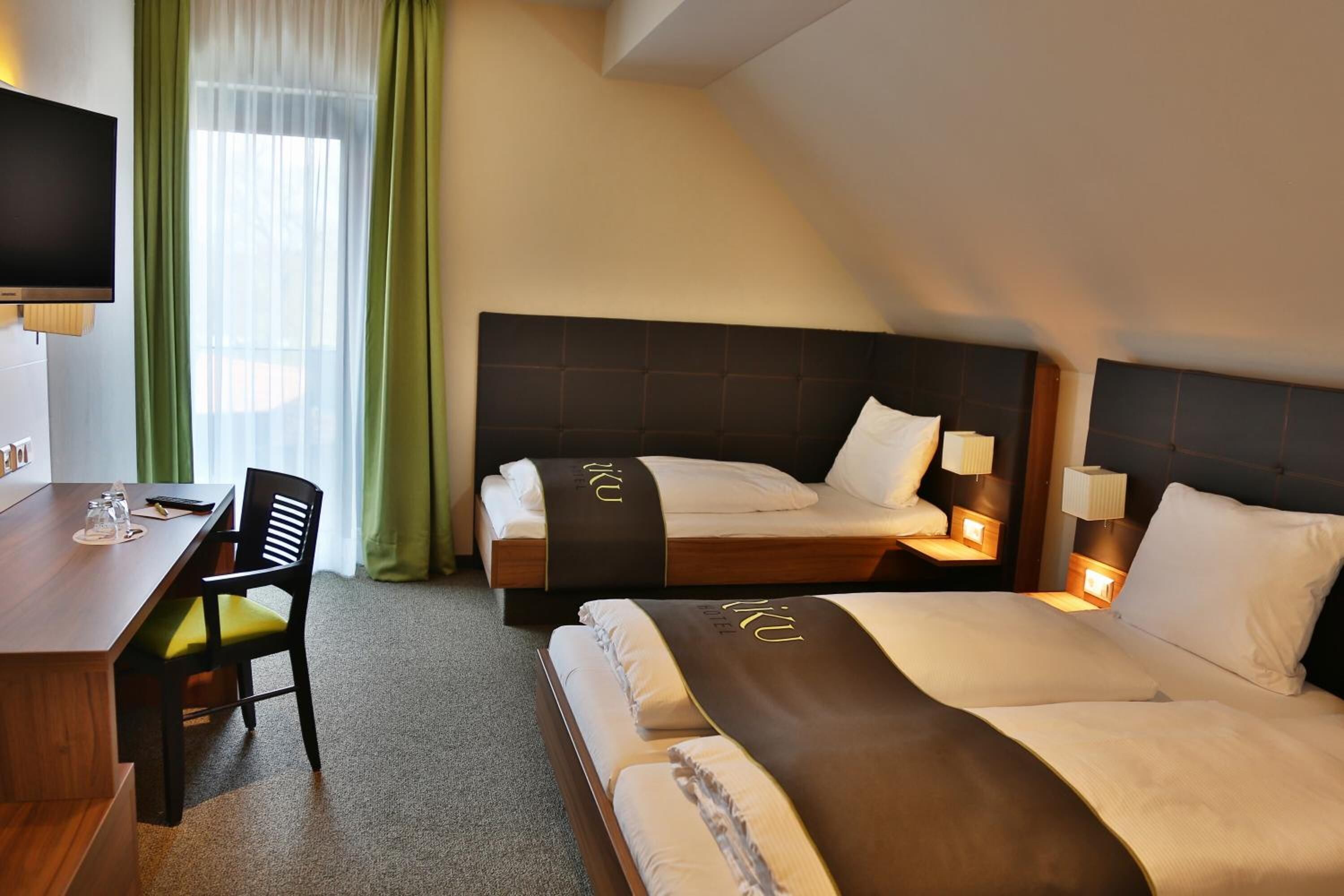 hypo-allergenic bedding, desk, blackout curtains, soundproofing