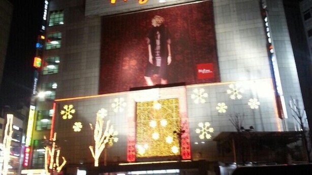 A building with a large illuminated sign reading "Misliore." - Dongdaemun Guest House (Seoul)