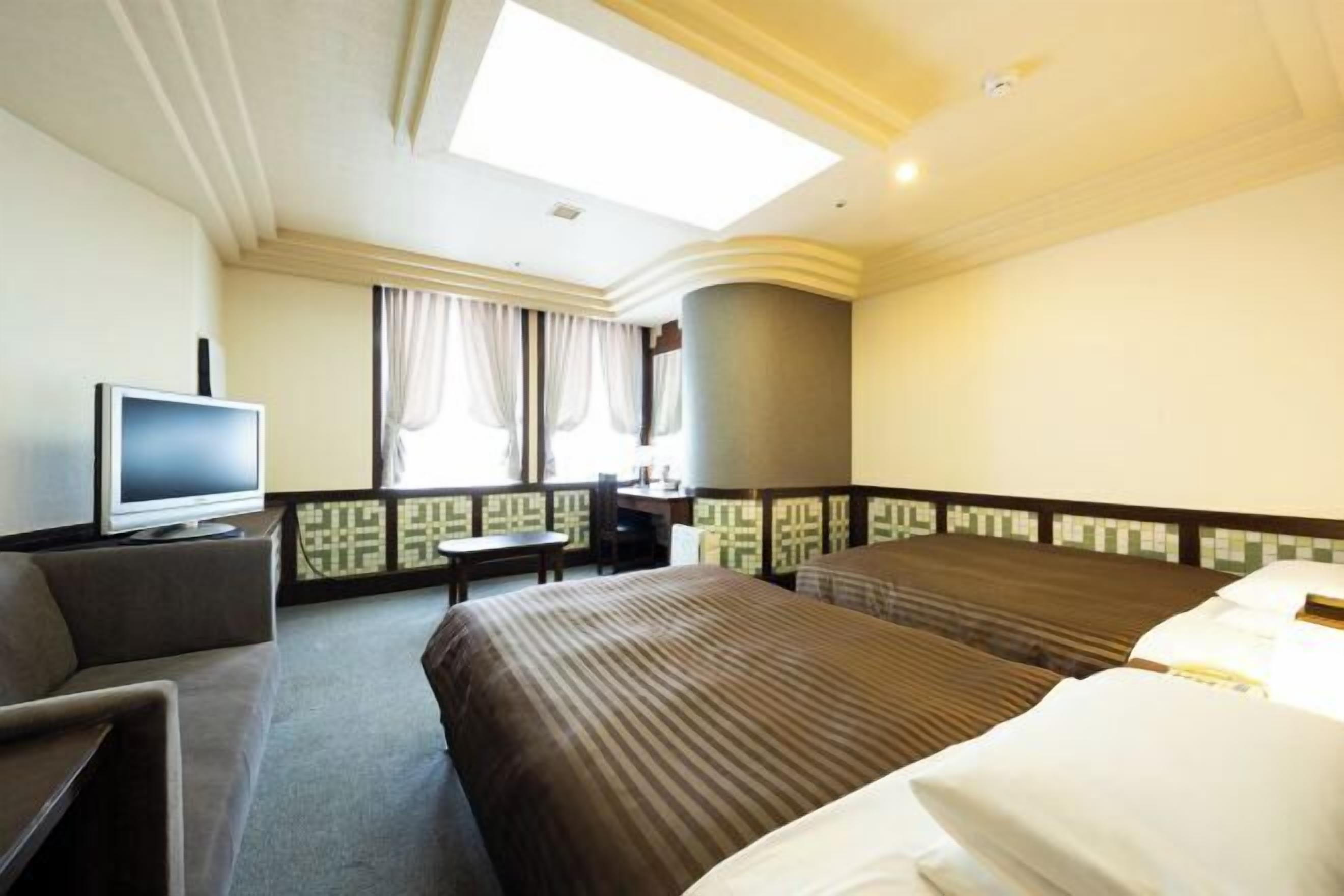 Desk, laptop workspace, free WiFi, bed sheets