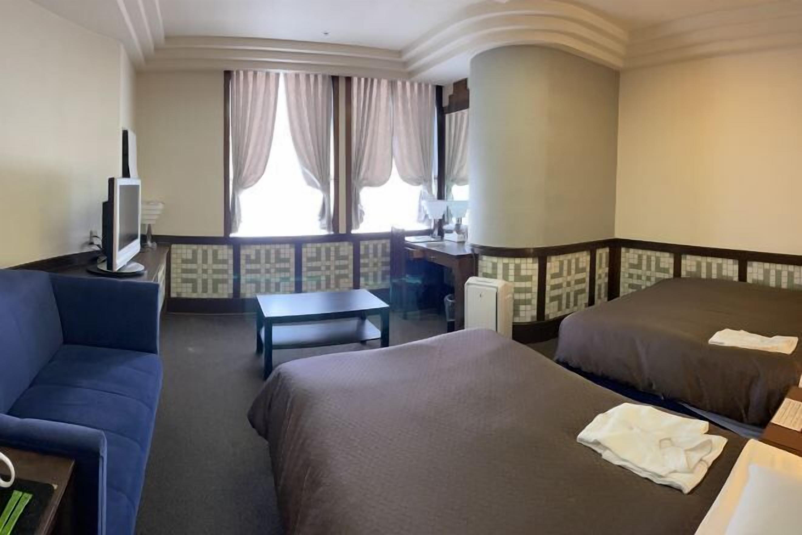 Desk, laptop workspace, free WiFi, bed sheets