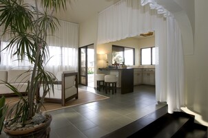 Penthouse, 2 Bedrooms | Living area | 32-inch flat-screen TV with satellite channels, TV