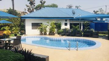 Outdoor pool, pool umbrellas, sun loungers