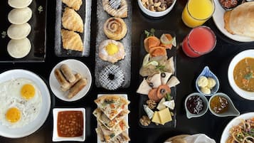 Daily buffet breakfast (USD 15 per person)