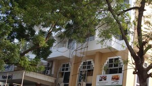 A hotel with a sign for 'NAYAGARA HOTELS' and 'CROZHA RESTAURANT'. - Nayagara Hotel (Chennai)