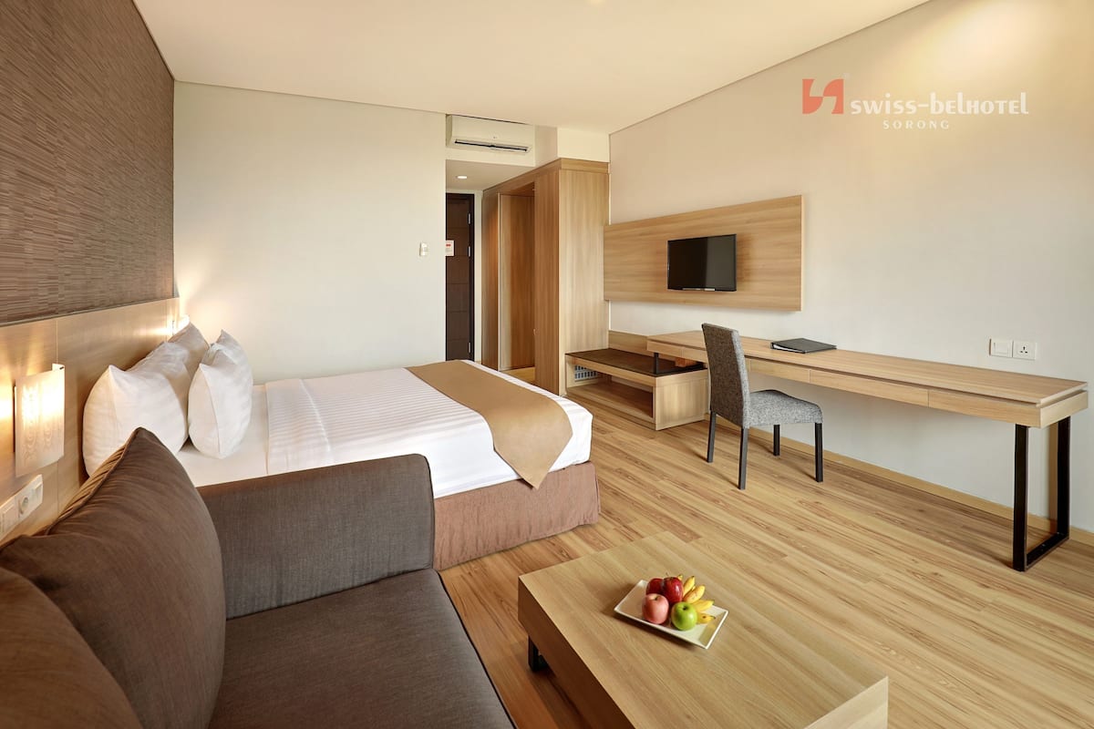 Luxe beddengoed, een minibar, een kluis op de kamer, een bureau