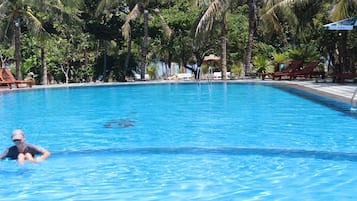 Outdoor pool, pool umbrellas, pool loungers