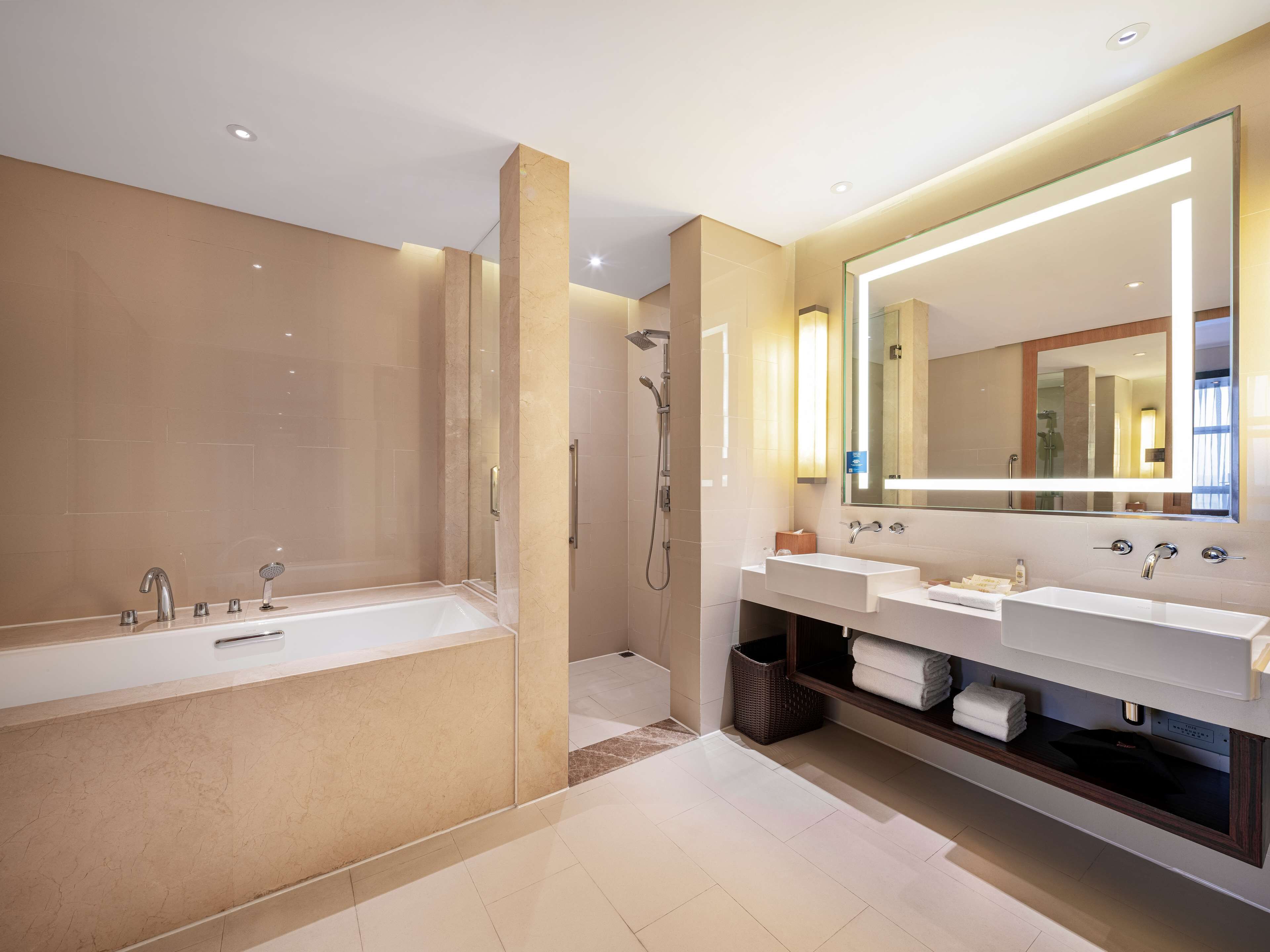 junior suite, 1 king bed | bathroom | free toiletries, towels