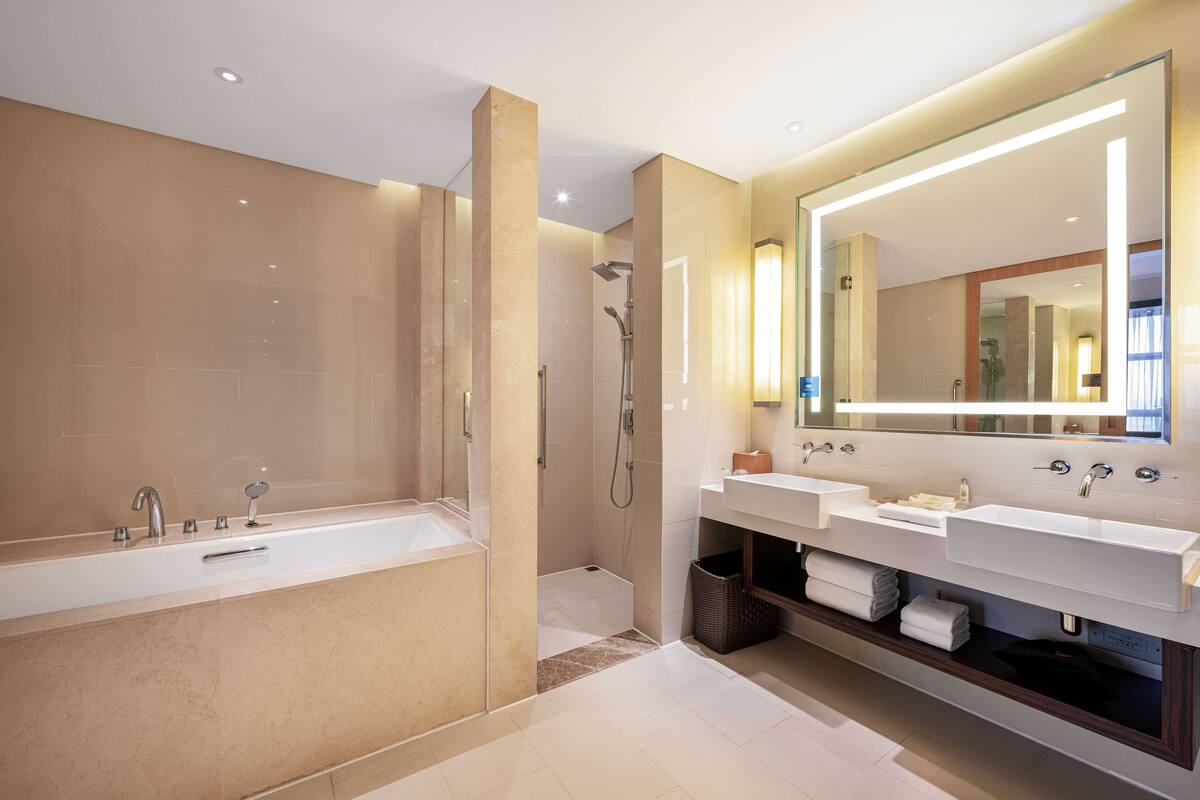 junior suite, 1 king bed | bathroom | free toiletries, towels