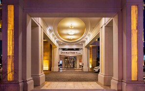 A grand entrance with a sign reading "DOUBLE TREE by Hilton" leading to a lobby area. - DoubleTree by Hilton Hotel Van (Edremit)