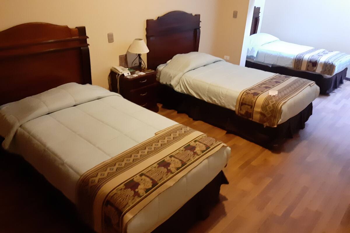 standard triple room, multiple beds, accessible | in-room safe, desk, iron/ironing board, free wifi