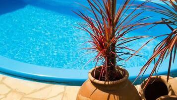 Outdoor pool, pool umbrellas, pool loungers