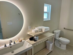 Suite, 1 King Bed, Kitchen (The Palm) | Bathroom | Shower, hair dryer, towels
