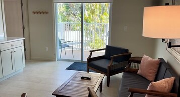 Suite, 1 King Bed, Kitchen (Tropical Paradise) | Living area | TV