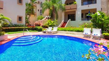 Outdoor pool, pool umbrellas, pool loungers