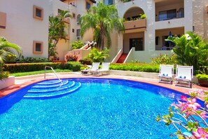 Outdoor pool, pool umbrellas, pool loungers
