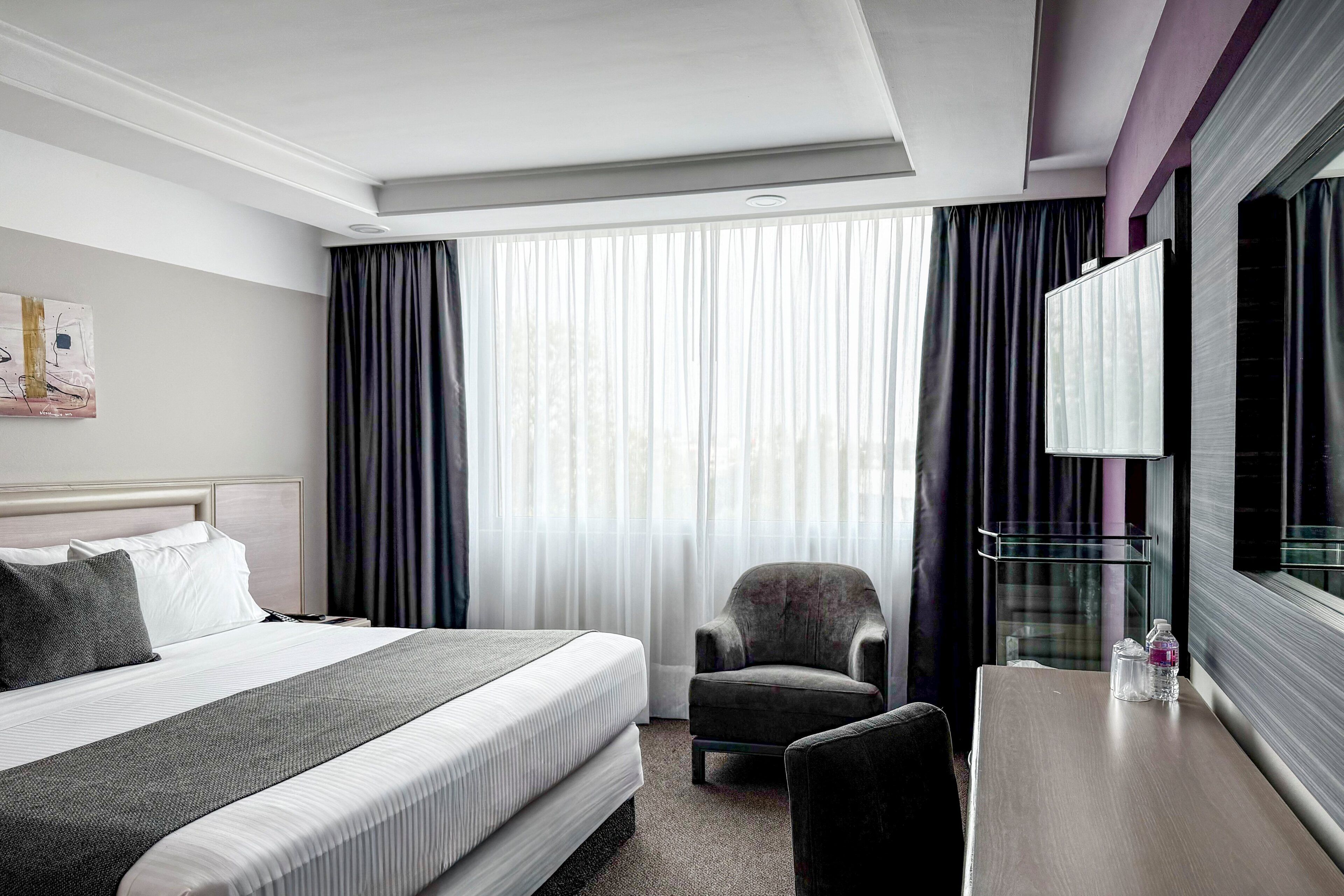 Quarto standard, 1 cama King | Cofres nos quartos, escrivaninha, Wi-Fi de cortesia