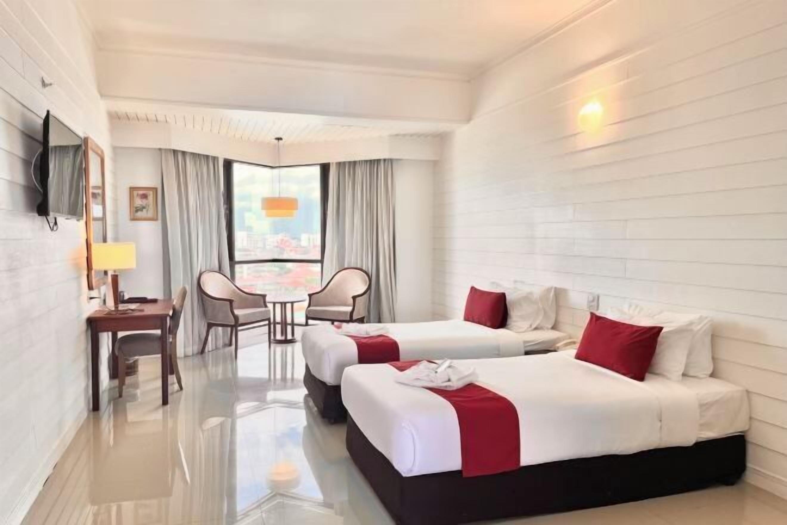 Desk, laptop workspace, blackout curtains, free WiFi