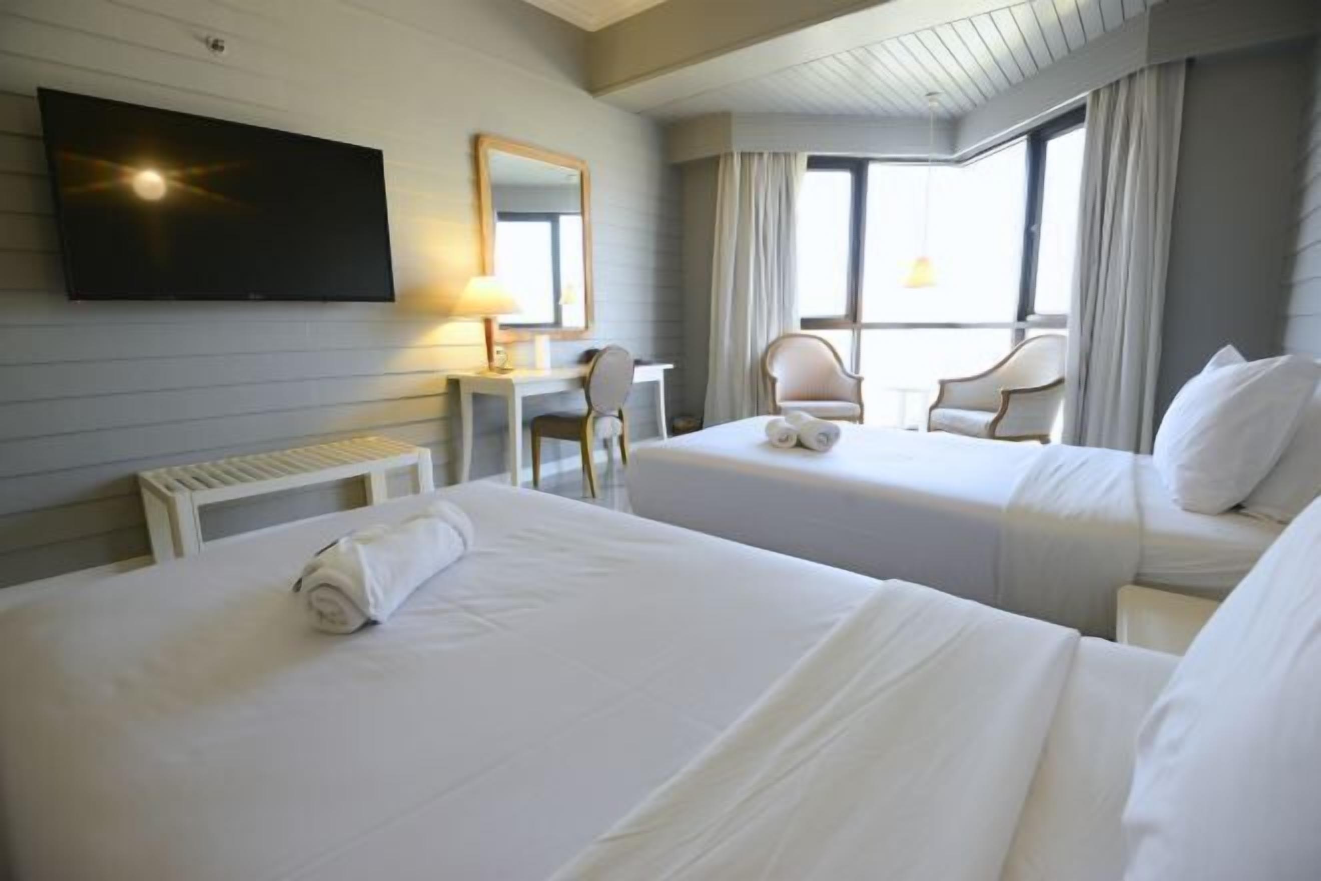 Desk, laptop workspace, blackout curtains, free WiFi